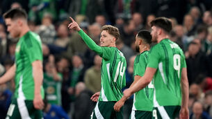 <p>Northern Ireland’s Isaac Price, centre, gave his team the lead. Pic: PA</p>