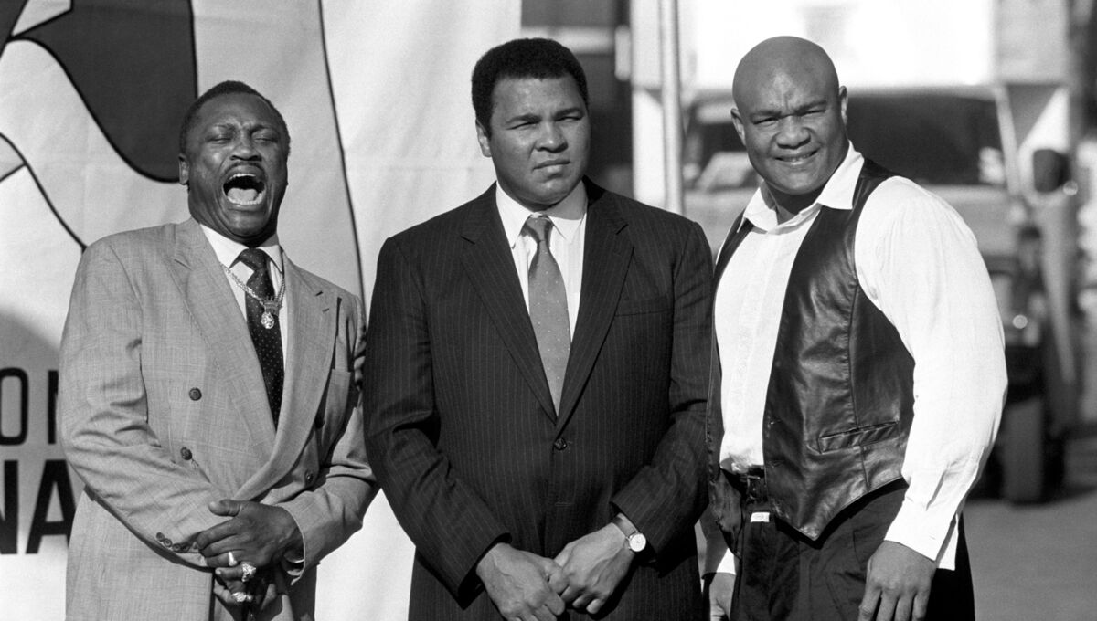 (L-R) Former World Heavyweight Champions Joe Frazier, George Foreman and Muhammad Ali, in London to publicize the launch of the video 'Champions Forever', a tribute to their fight careers