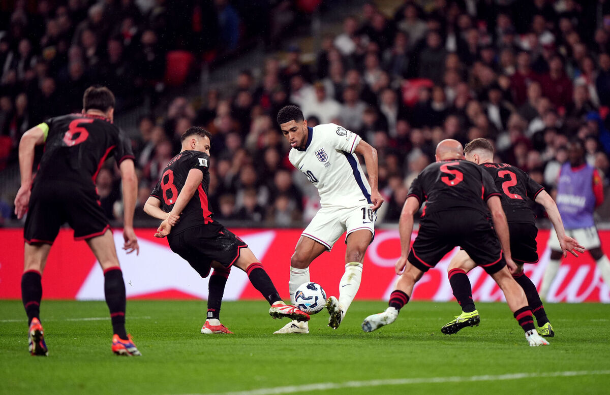 Bellingham is surrounded by Albania players in the World Cup qualifier at Wembley. Picture: Bradley Collyer/PA