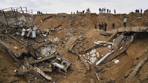 <p>Palestinians inspect the rubble of a structure hit by an Israeli bombardment in Deir al-Balah, Gaza Strip on Saturday, March 22, 2025. Pic: AP Photo/Abdel Kareem Hana</p>
