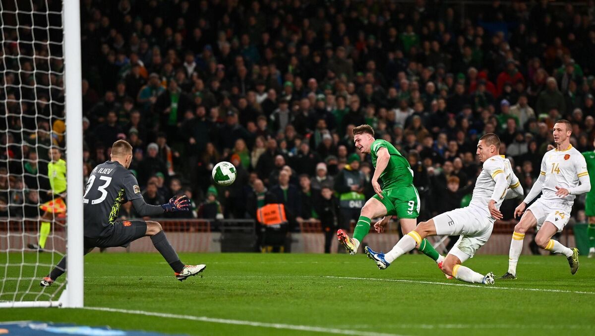 Evan Ferguson of Republic of Ireland shoots to score his side's first goal. Pic: Ben McShane/Sportsfile