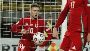 <p>David Brooks, left, scored the last-gasp equaliser. Picture: Boris Grdanoski/AP</p>