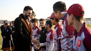 <p>Abhishek Bachchan meets members of the Adamstown Cricket Club in Lucan, Dublin. The Bollywood star is a co-founder of the European T20 series. Pic: Ramsey Cardy/Sportsfile</p>
