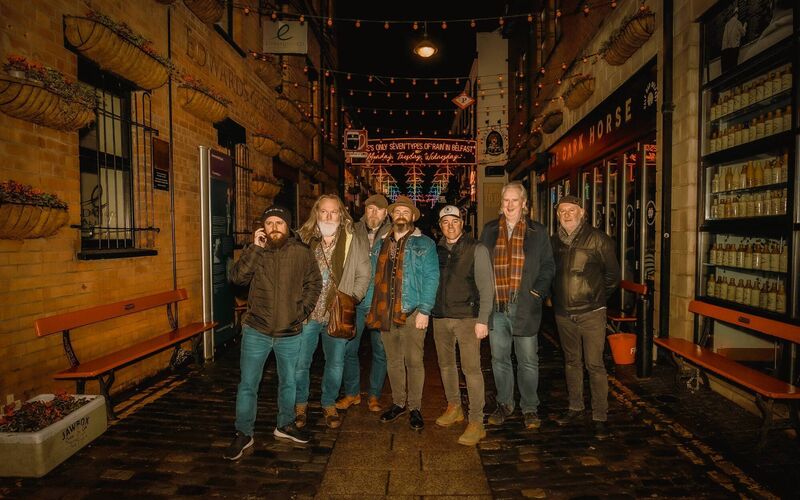 Members of The White Horse Guitar Club, briefly visiting Belfast's Cathedral Quarter between shows on their recent Irish tour. 
