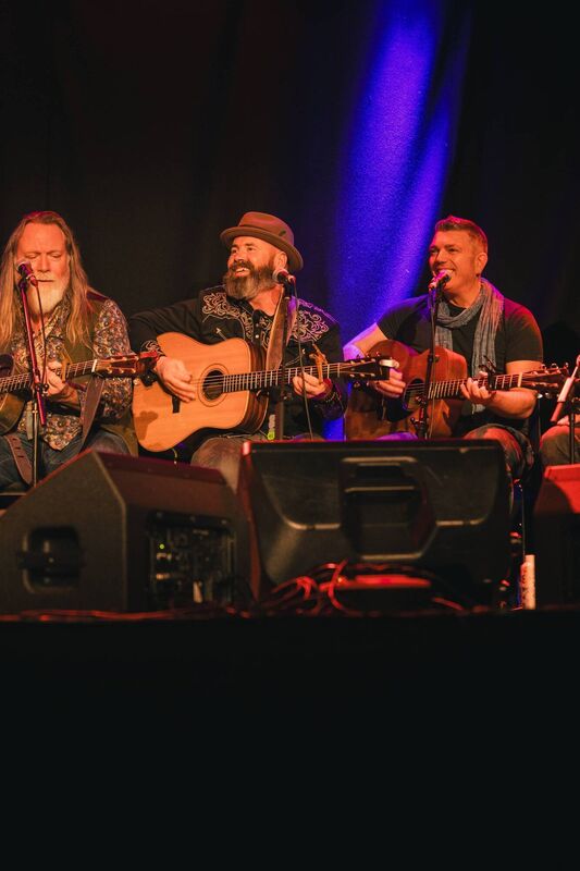 The White Horse Guitar Club, on stage in The Black Box, Belfast. 