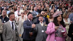 <p>MERSEY BEAT: Racegoers cheer as Jockey Paul Townend wins the Randox Grand National riding I Am Maximus last year. Pic: Christopher Furlong/Getty Images)</p>