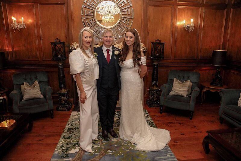 Amber Coffey with Ann and Dan Coffey. Amber Coffey with Ann and Dan Coffey.