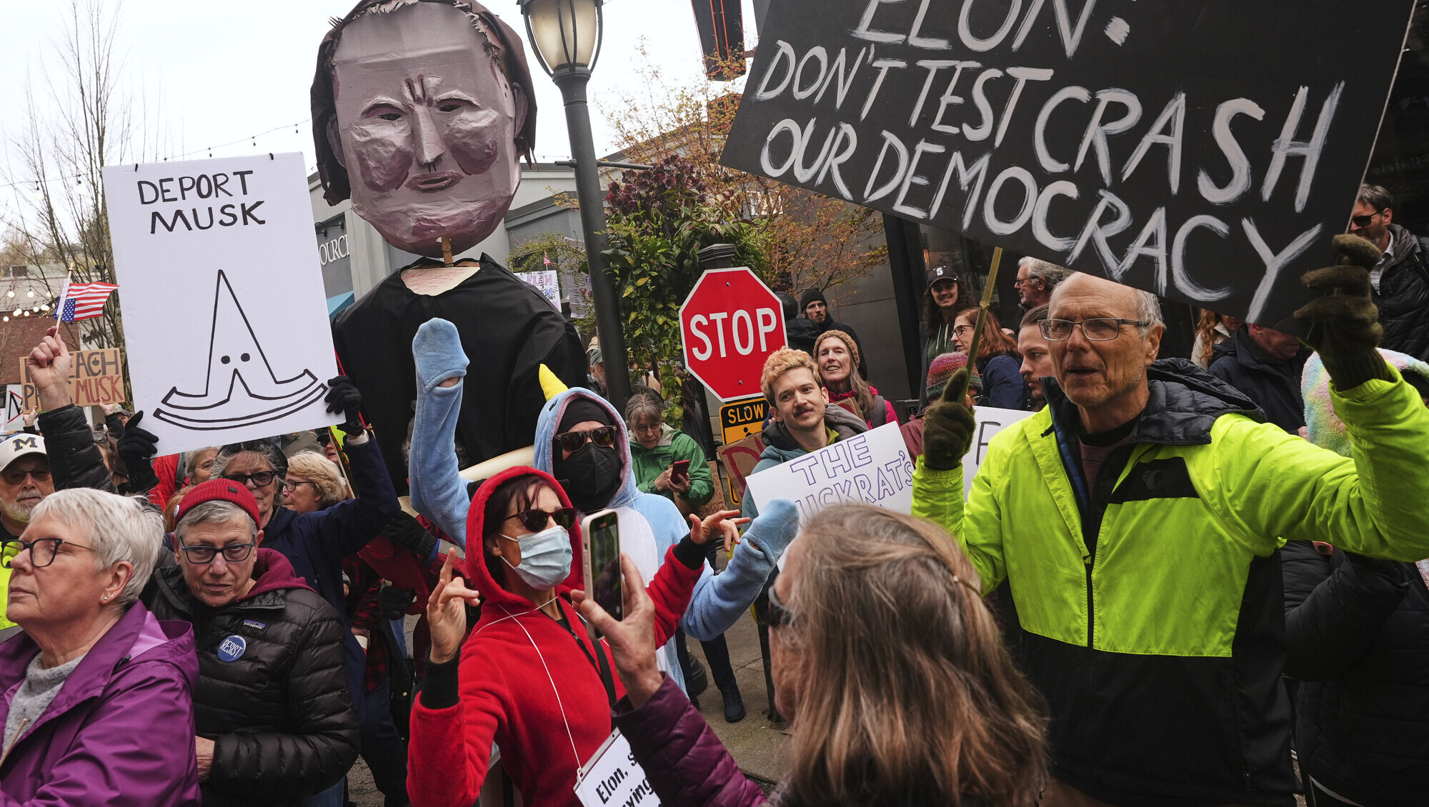 Anti-Musk protesters aiming to ‘take down Tesla’ gather outside dealerships