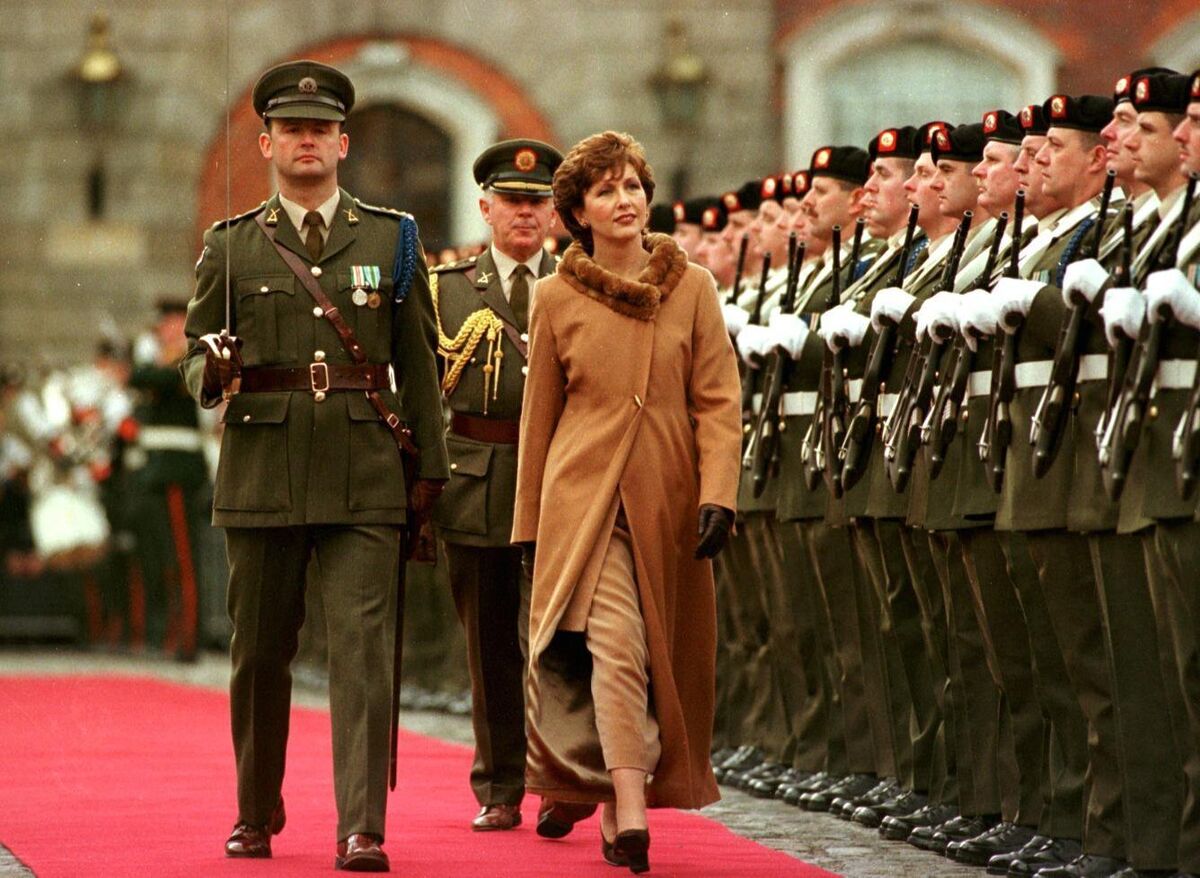 President Mary McAleese inspecting a guard of honour following herinauguration. President Mary McAleese inspecting a guard of honour following herinauguration.