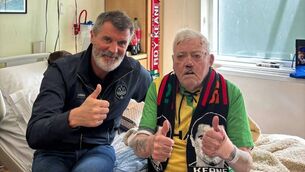 <p>Former Ireland and Manchester United legend Roy Keane visits Pat O'Sullivan in the Mercy Hospital in Cork</p>