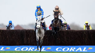 <p>GALLANT GREY: Kandoo Kid en route to winning the Coral Gold Cup at Newbry in November.  	Picture: Adam Davy/PA</p>