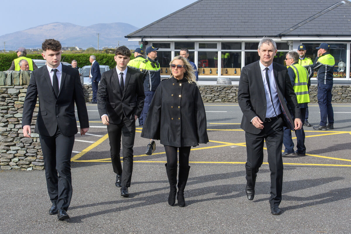  Karl Dwyer with his family at the Requiem Mass for his father Mick O'Dwyer at St Finian’s Church, Waterville, Co Kerry. Picture Dan Linehan