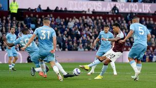 <p>Aston Villa's Morgan Rogers (second right) has a shot blocked by Nottingham Forest's Willy Boly (left). Picture: Jacob King/PA Wire</p>