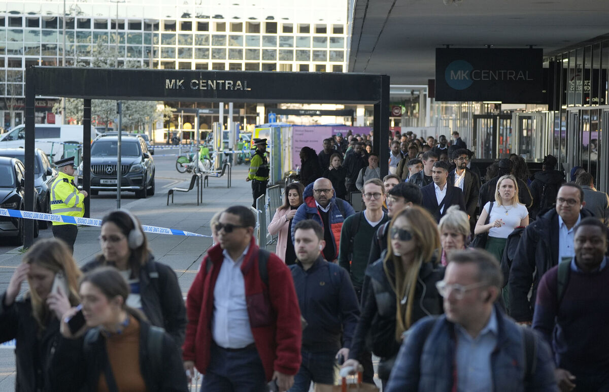 Passengers making their way from Milton Keynes train station last Tuesday as Thames Valley Police and British Transport Police officers sealed off part of the station. Picture: Andrew Matthews/PA Passengers making their way from Milton Keynes train station last Tuesday as Thames Valley Police and British Transport Police officers sealed off part of the station. Picture: Andrew Matthews/PA