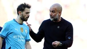 <p>PEP TALK: Manchester City manager Pep Guardiola (right) talks with Bernardo Silva. Pic: : Martin Rickett/PA Wire.</p>