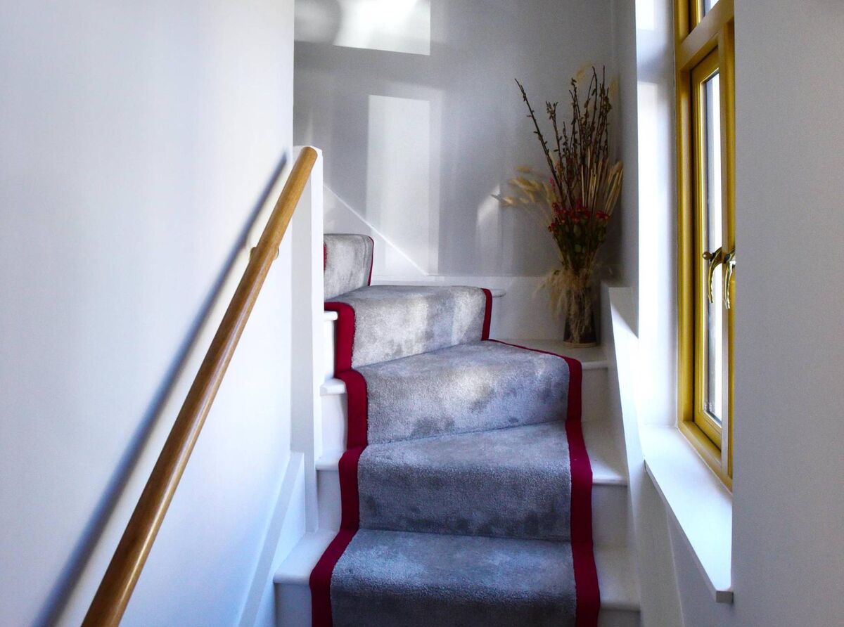 Stair risers are perfect for hidden drawers. Picture: Moya Nolan