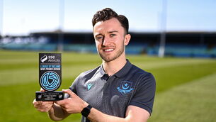<p>Darragh Markey of Drogheda United with his SSE Airtricity / SWI Player of the Month Award for March. Pic: Ben McShane/Sportsfile</p>