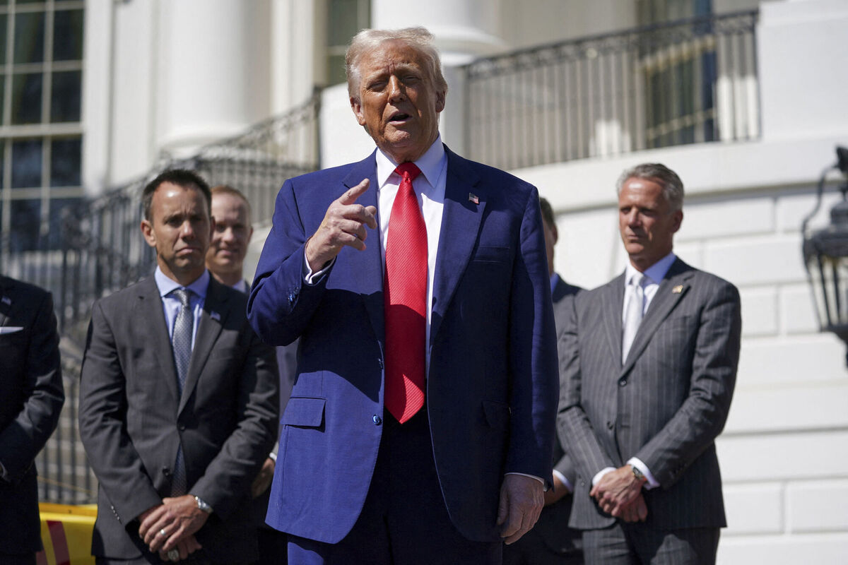 President Donald Trump speaks during an event with auto racing champions at the South Portico of the White House Wednesday, April 9, 2025, in Washington, (Pool via AP)