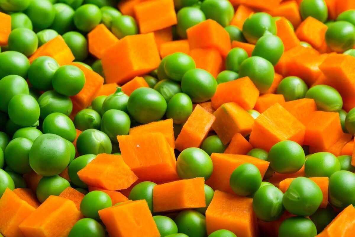 Fresh peas and carrots, a mouthwatering addition to any meal. Fresh peas and carrots, a mouthwatering addition to any meal.