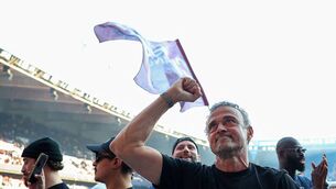 <p>Paris Saint-Germain's headcoach Luis Enrique celebrates after a win over SCO Angers at The Parc des Princes Stadium last week to clinch the Ligue 1 title. Photo by FRANCK FIFE/POOL/AFP via Getty Images</p>