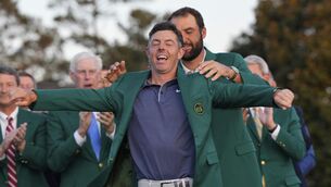 <p>FITS SO GOOD: Scottie Scheffler puts the green Jacket on winner, Rory McIlroy at the Masters golf tournament, Sunday, April 13, 2025, in Augusta, Ga. (AP Photo/David J. Phillip)</p>