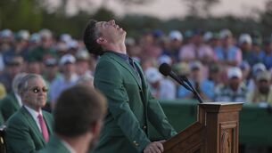 <p>Rory McIlroy looks upward while speaking after putting on the green Jacket after winning the Masters. Pic: AP Photo/Matt Slocum.</p>