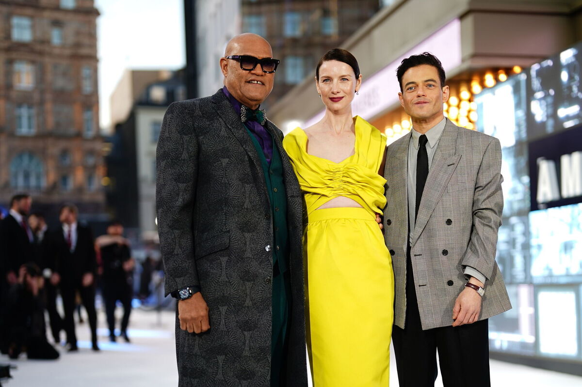 Laurence Fishburne, Caitriona Balfe and Rami Malek in London for a screening of The Amateur. Picture: Jordan Pettitt/PA Wire Laurence Fishburne, Caitriona Balfe and Rami Malek in London for a screening of The Amateur. Picture: Jordan Pettitt/PA Wire