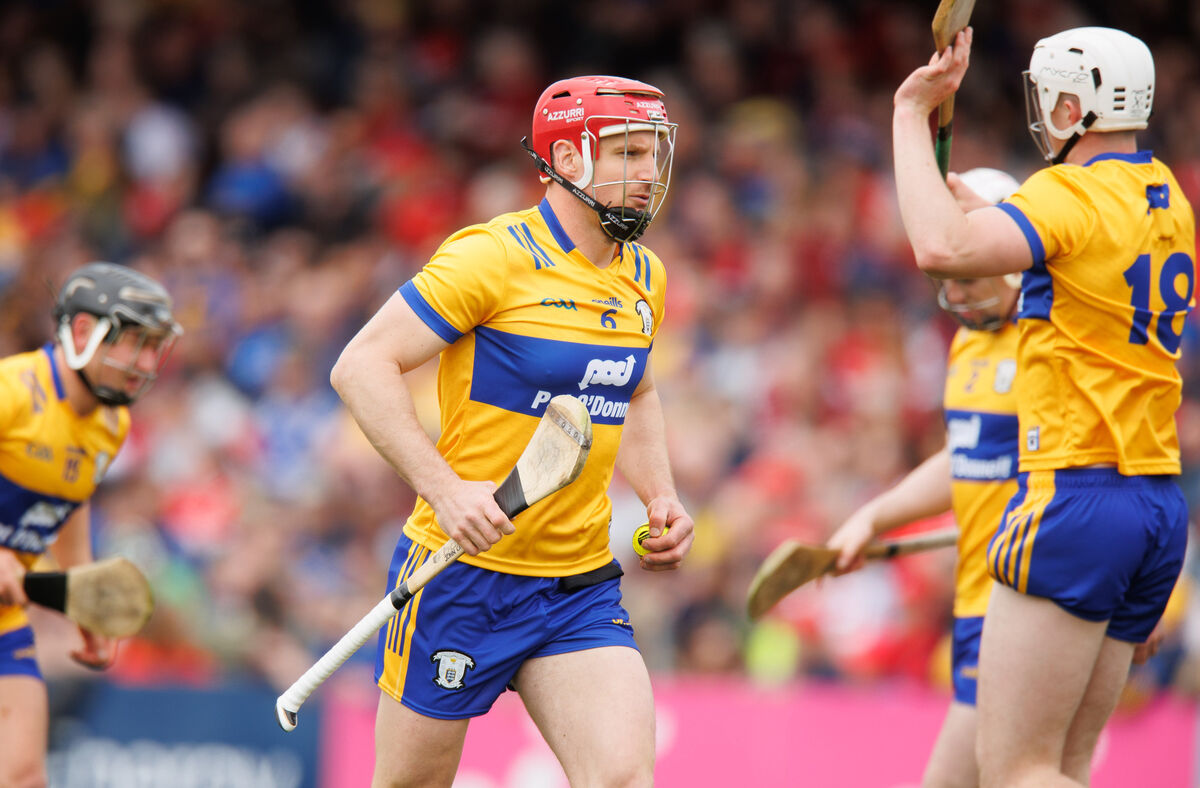 Clare's John Conlon warms up ahead of the game. Pic: INPHO/Tom Maher
