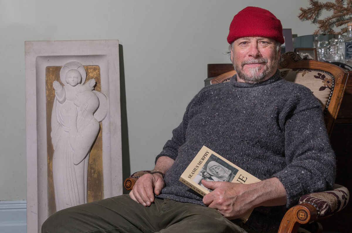 Colm Murphy at home with a stone cutting by his father, Seamus Murphy. Picture: David Creedon