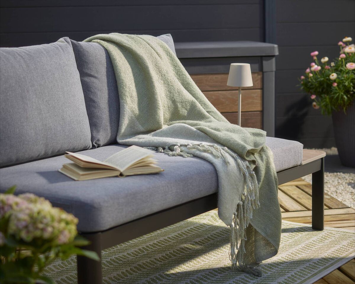 Throw in a beautifully designed outdoor rug. Throw in a beautifully designed outdoor rug.