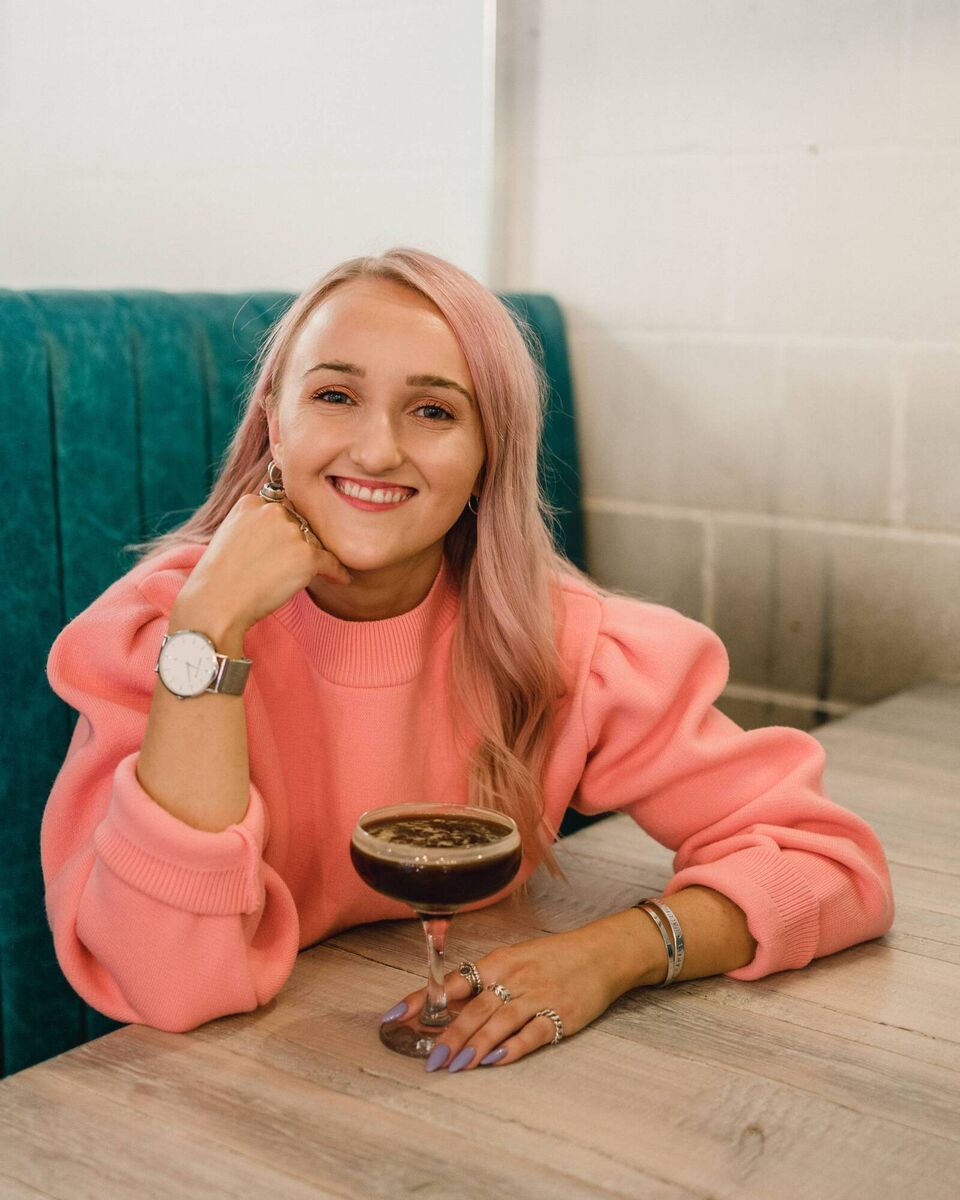 Millie Gooch, pictured here with an alcohol-free cocktail, is the founder and CEO of the Sober Girls Society 