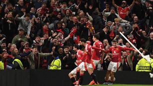 <p>PASSION PLAY: Harry Maguire, centre, celebrates after scoring Manchester United’s winning goal in their dramatic Europa league quarter-final win over Lyon at Old Trafford. Pic:OLI SCARFF/AFP via Getty Images</p>