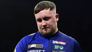 <p>Luke Littler was beaten 6-5 by Michael van Gerwen in Liverpool. Pic: Peter Byrne/PA</p>