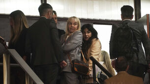 Gianinna Maradona, centre right, daughter of the late soccer star. and her mother Claudia Villafane, wait to enter the courtroom in San Isidro, on the outskirts of Buenos Aires on April 15 (Emmanuel Fernandez/AP)