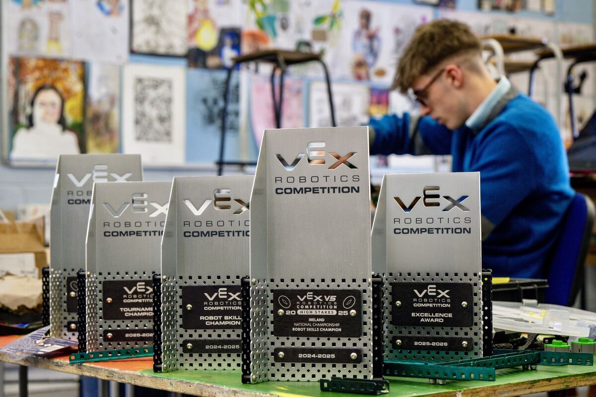 Colm Doyle of the Gaelcholáiste Choilm robotics team pictured with the awards that earned them a place at the VEX World Finals in Texas. Picture: Chani Anderson