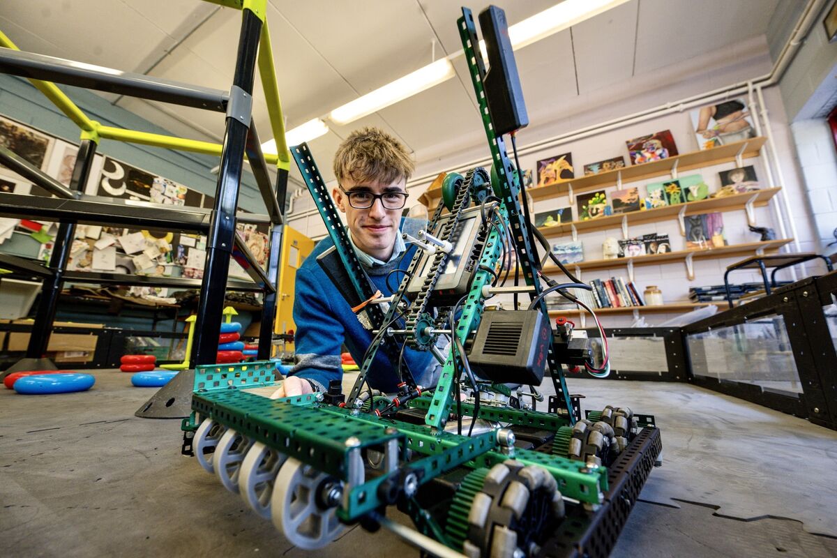 Colm Doyle, team captain of Gaelcholáiste Choilm’s robotics team: 'There are a lot of jokes that I’m like the new dad with the baby pulling out the photographs to show friends.' Picture Chani Anderson