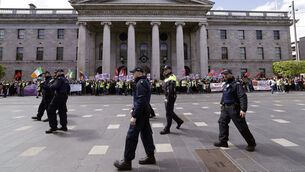 <p>Gardaí on duty near the GPO where a demonstration took place to counter an anti-immigration protest in Dublin City centre. Picture: Conor O Mearain/PA Wire</p> <p>Gardaí on duty near the GPO where a demonstration took place to counter an anti-immigration protest in Dublin City centre. Picture: Conor O Mearain/PA Wire</p>