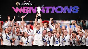 <p>TO THE VICTORS: England's Zoe Aldcroft lifts the trophy after winning the Guinness Women's Six Nations match at Allianz Stadium, London. Pic: Adam Davy/PA Wire</p>