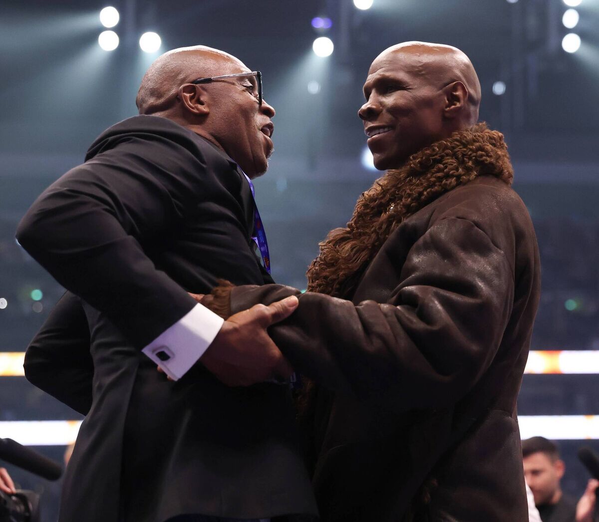 Nigel Benn, Former Professional Boxer and Father to Connor Benn, and Chris Eubank, Former Professional Boxer and Father to Chris Eubank Jr, react in the ring together ahead of the Middleweight fight between Chris Eubank Jr and Conor Benn as part of the Fatal Fury - Fight Night at Tottenham Hotspur Stadium on April 26, 2025 in London, England. (Photo by Richard Pelham/Getty Images)