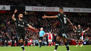 <p>Mohamed Salah of Liverpool celebrates with Cody Gakpo after scoring his team's second goal during the Premier League match between Arsenal FC and Liverpool FC at Emirates Stadium on October 27, 2024 in London, England. (Photo by Shaun Botterill/Getty Images)</p>
