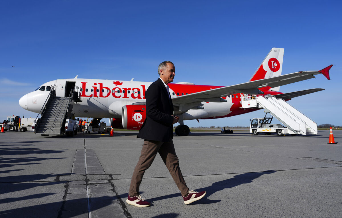 Liberal Leader Mark Carney arrives in Ottawa, Canada, Monday, April 28, 2025. (Sean Kilpatrick/The Canadian Press via AP) Liberal Leader Mark Carney arrives in Ottawa, Canada, Monday, April 28, 2025. (Sean Kilpatrick/The Canadian Press via AP)