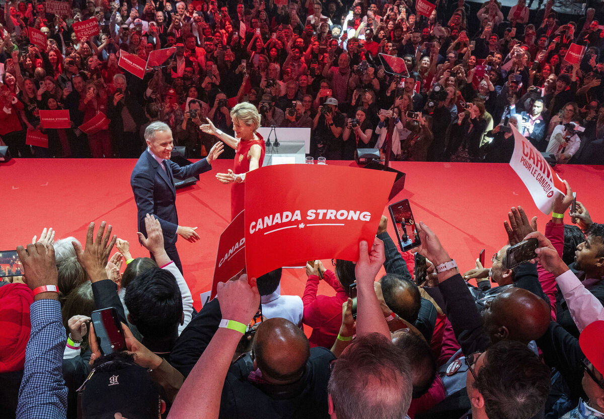 Canadian Prime Minister Mark Carney and his wife Diana Fox Carney react on stage at his campaign headquarters after the Liberal Party won the Canadian election in Ottawa on Tuesday, April 29, 2025. (Frank Gunn/The Canadian Press via AP) Canadian Prime Minister Mark Carney and his wife Diana Fox Carney react on stage at his campaign headquarters after the Liberal Party won the Canadian election in Ottawa on Tuesday, April 29, 2025. (Frank Gunn/The Canadian Press via AP)