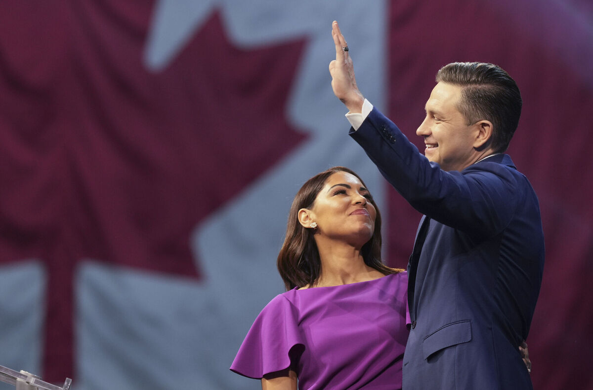 Conservative Leader Pierre Poilievre and his wife Anaida at his campaign headquarters on election night, in Ottawa, Tuesday, April 29, 2025. (Christinne Muschi/The Canadian Press via AP) Conservative Leader Pierre Poilievre and his wife Anaida at his campaign headquarters on election night, in Ottawa, Tuesday, April 29, 2025. (Christinne Muschi/The Canadian Press via AP)