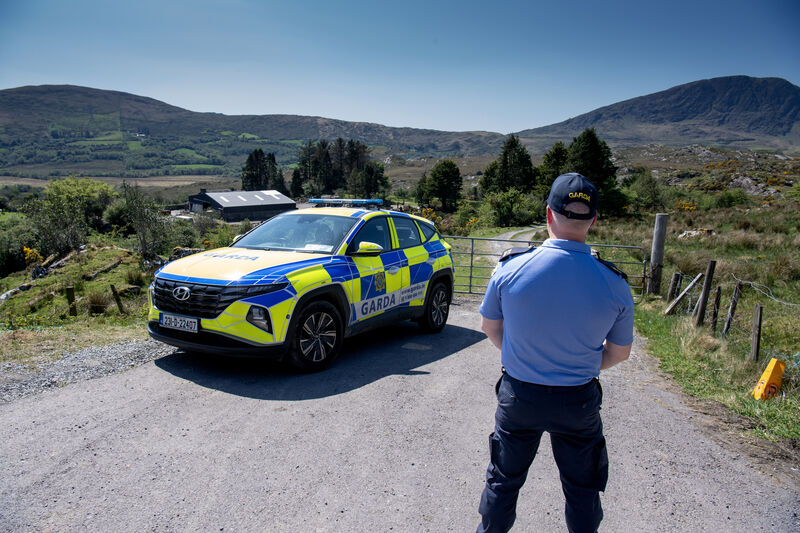 A Garda stands in front of Michael Gaine s Farm in Kenmare, Michael was reported missing from his home near Kenmare. Picture: Domnick Walsh