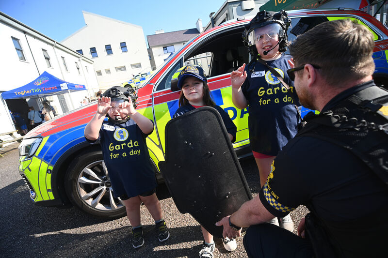(Left to right) Nathan, Brook, and Emily learn about the Armed Support Unit at the training programme at Togher Garda Station. Picture: Larry Cummins (Left to right) Nathan, Brook, and Emily learn about the Armed Support Unit at the training programme at Togher Garda Station. Picture: Larry Cummins