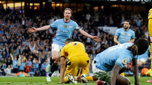 <p>Manchester City's Kevin De Bruyne (left) celebrates scoring their side's first goal. Pic: Martin Rickett/PA Wire.</p>