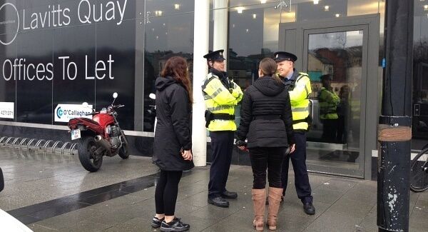 Apple workers on the street due to at security alert at Lavitt's Quay in Cork. Pic Des Barry