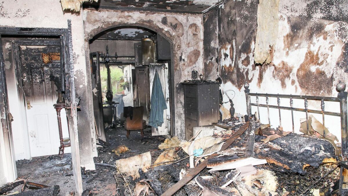 The interior of the home in Ballincrokig, Cork where two petrol bombs were thrown through the bedroom window causing extensive damage. Picture: David Creedon