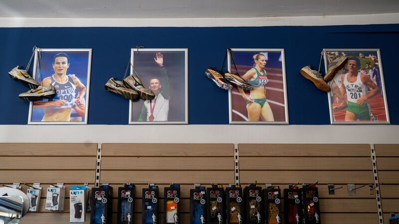  The ‘Running Wall’ inside John Buckley Sports showcasing signed shoes donated by legendary Irish athletes. Picture: Chani Anderson