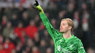 <p>Liverpool goalkeeper Caoimhin Kelleher. Pic: NICOLAS TUCAT/AFP via Getty Images </p>